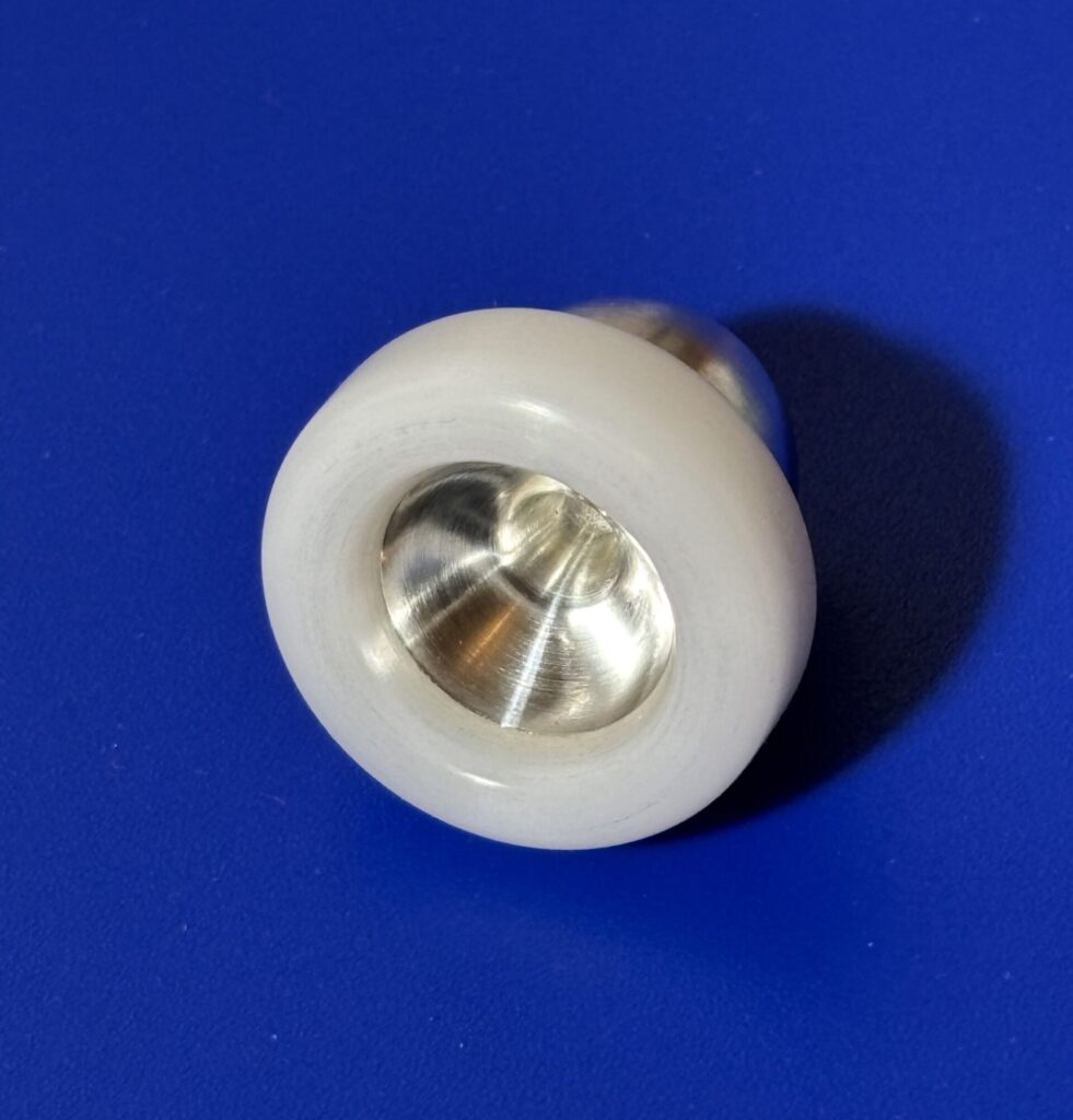 Chop problem for brass player caused by brass allergy solved by trumpet mouthpiece with plasic/Lexan rim.